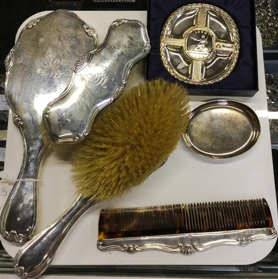 Four-piece silver-backed dressing table set, circular silver dish & Bank of England silver commemorative dish